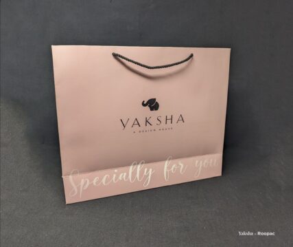 Personalized Paper Bag from Yaksha Design House, filled with unique design and embroidery items