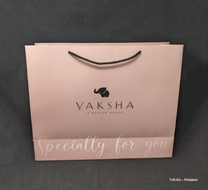 Stack of Personalized Paper Bags from Yaksha Design House, highlighting its capacity and style