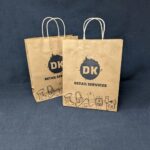 Customer holding the eco-friendly and affordable Kraft Paper Bag from DK Retail