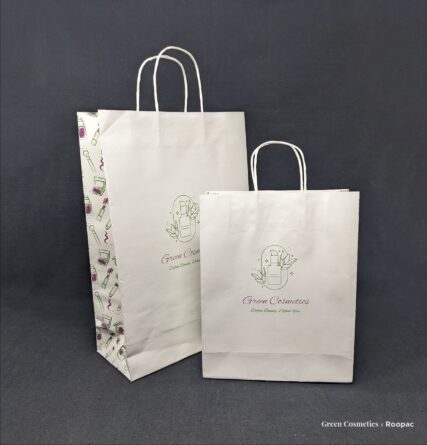 Shopper in Maldives holding our vibrant and sturdy Green Cosmetics Paper Bag