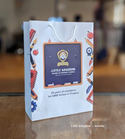 Tiruppur's Pride: The Little Kingdom School Paper Bag showcasing school crest