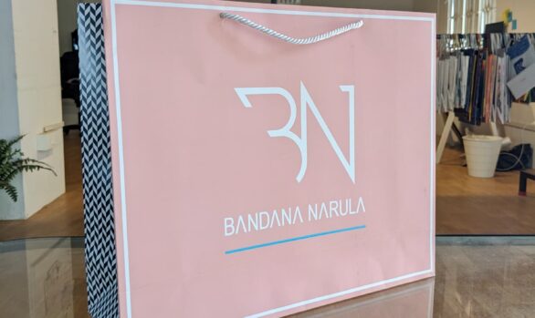 Bandana Narula Signature Paper Bag filled with Indo-western contemporary clothing
