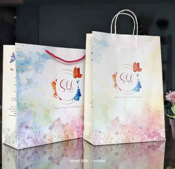 A stylish and eco-friendly Shruthi Silks' designer paper bag for boutique stores, made in Annur, Coimbatore