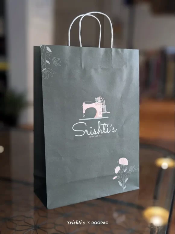 Artistically designed Creative Paper Bag for carrying Srishti's Boutique unique fashion items
