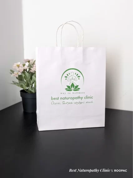 Roopac's eco-friendly printed paper bag with the Best Naturopathy Clinic's logo printed on it.