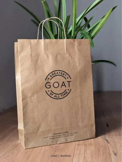 Roopac Durable Brown Kraft Bags filled with men's clothes at Goat Men's Clothing Store in Dindigul.