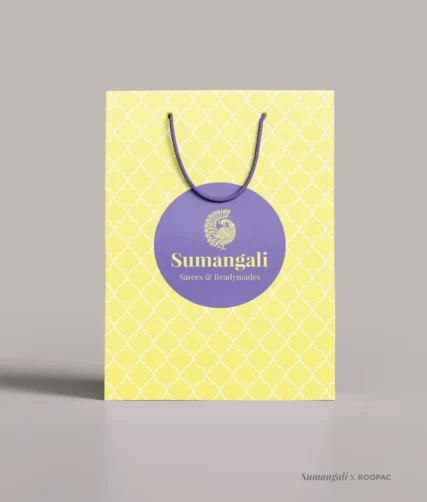Elegant paper bag from Sumangali Sarees & Readymades, Thiruvarur