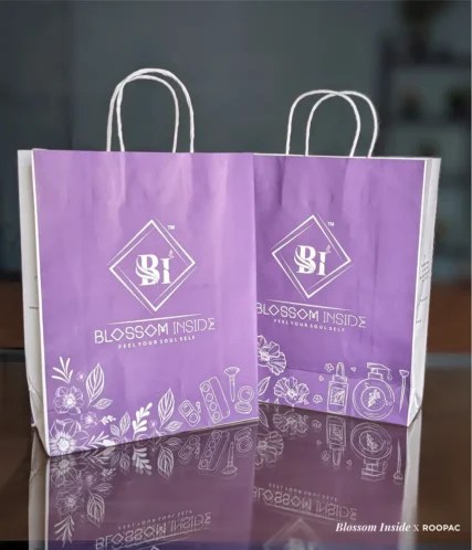 Stylish paper bag by Blossom Inside, perfect for beauty products.