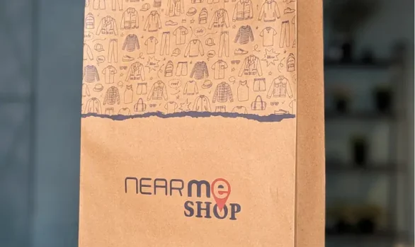Near Me Shop's durable Kraft paper bag with blue and red prints