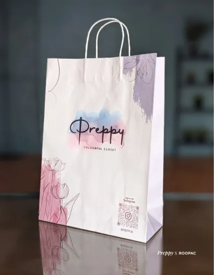 Fashionable paper bag from Preppy, perfect for women's clothing.