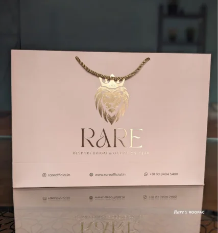 Elegant shopping bag by RARE, featuring a majestic gold lion design. Coimbatore