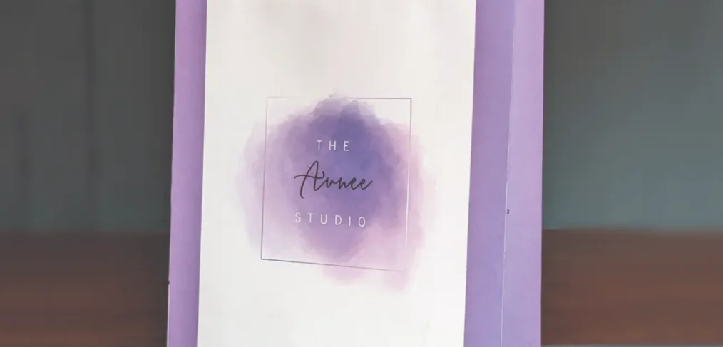 The Avnee Studio's blue and purple pastel paper bag