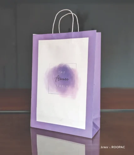 The Avnee Studio's blue and purple pastel paper bag