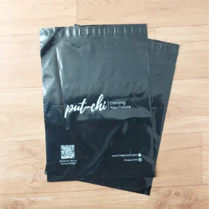 Durable black poly mailers with white print, crafted by Roopac for The Putchi