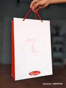 Ramsons Clothing Paper Bags by Roopac, showcasing quality packaging for fashion in Kerala