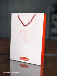 Roopac’s custom-designed paper bags for Ramsons Clothing, available across Kerala