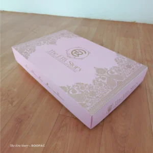 The Era Story pink saree box with gold paisley design